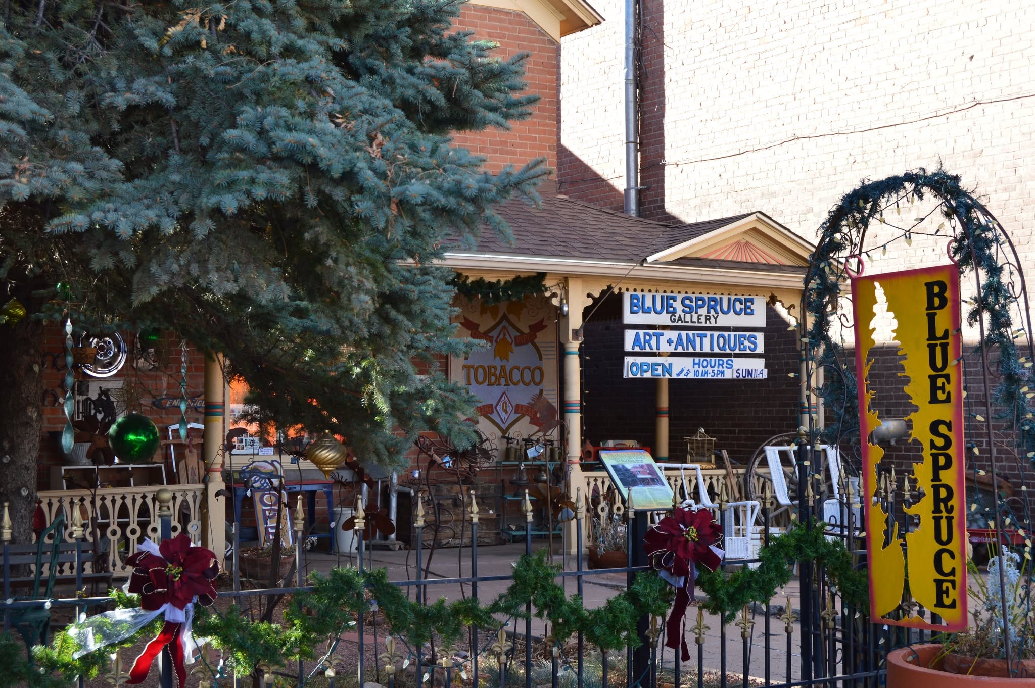 Front of Blue Spruce Art and Antiques in Florence, Colorado